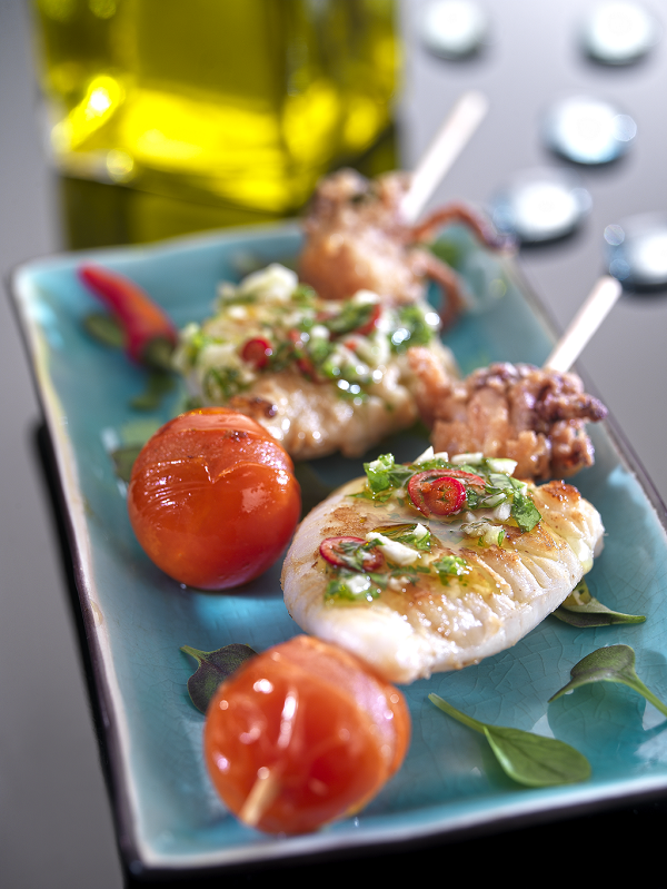 Baby squid skewers with garlic and parsley