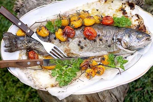 Basque poached basswith cherry tomatoes