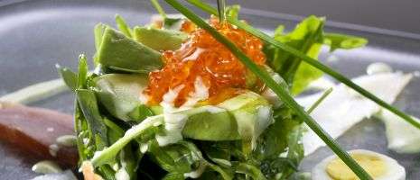 Roquette salad with smoked fish and avocado