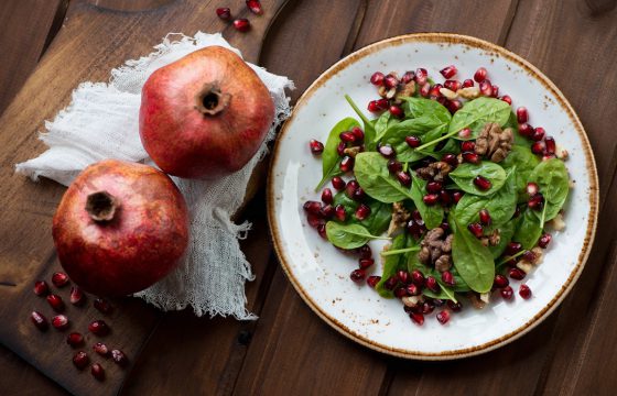 Salad with pomegranate and extra virgin olive oil